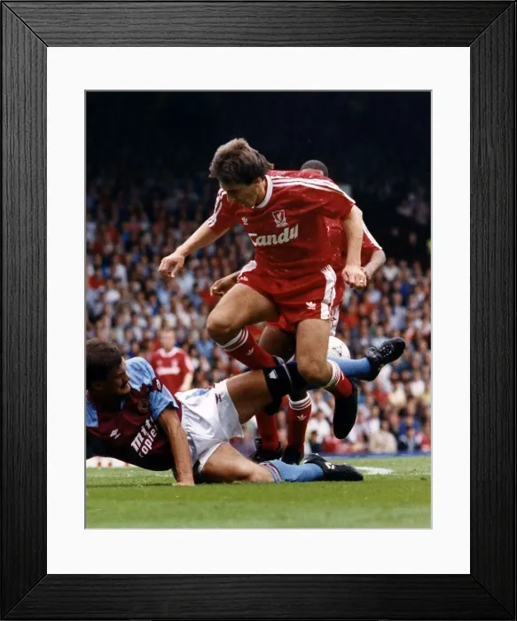 Framed Print : Liverpool footballer Peter Beardsley avoiding tackle from Aston Villa player Derek Framed Print : Liverpool footballer Peter Beardsley avoiding tackle from Aston Villa player Derek