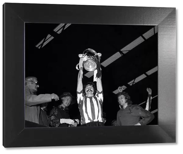 Bobby Kerr Sunderland captain lifts cup after beating Leeds United in the FA cup final