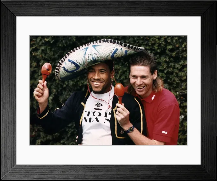 Framed Print : England footballers John Barnes and Chris Waddle take a break during an England training Framed Print : England footballers John Barnes and Chris Waddle take a break during an England training