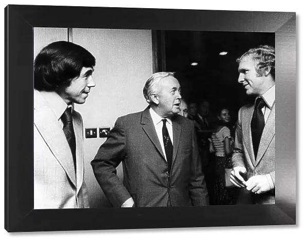 Harold Wilson Labour Prime Minister of Britain chats to Bobby Moore former captain of