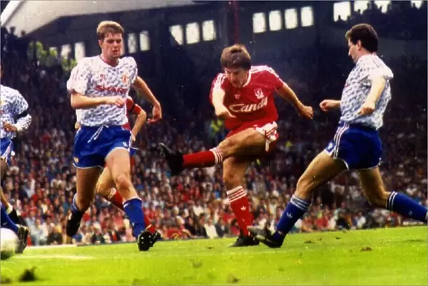 Peter Beardsley scores for Liverpool against Manchester United at Anfield