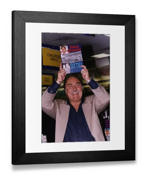 Framed Print : Jimmy Greaves football commentator TV presenter promoting his book