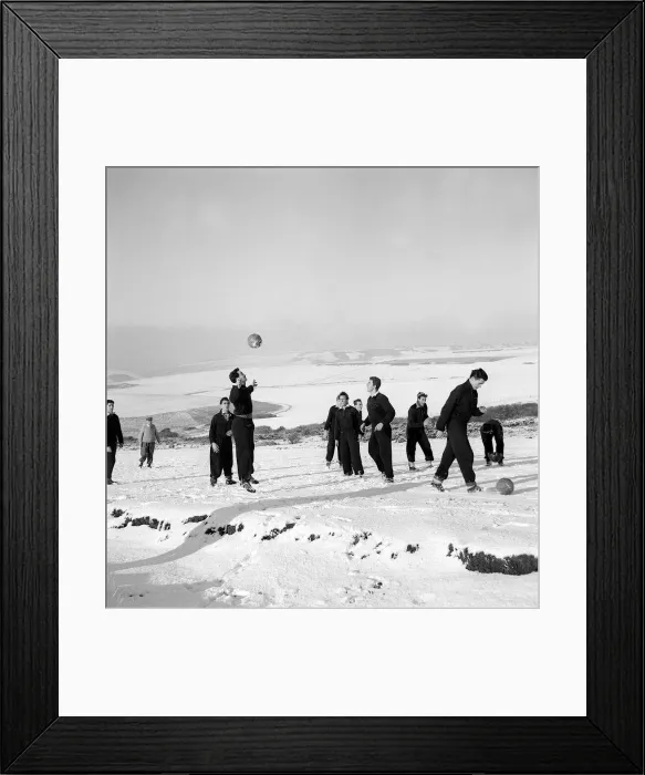 Framed Print : Memebers of Charlton Athletic training in the snow at Eastbourne January 1958
