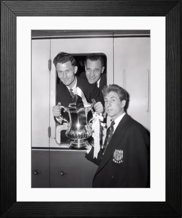 Framed Print : West Bromwich Albion Players on the the train with the FA Cup trophy as they leave London Framed Print : West Bromwich Albion Players on the the train with the FA Cup trophy as they leave London