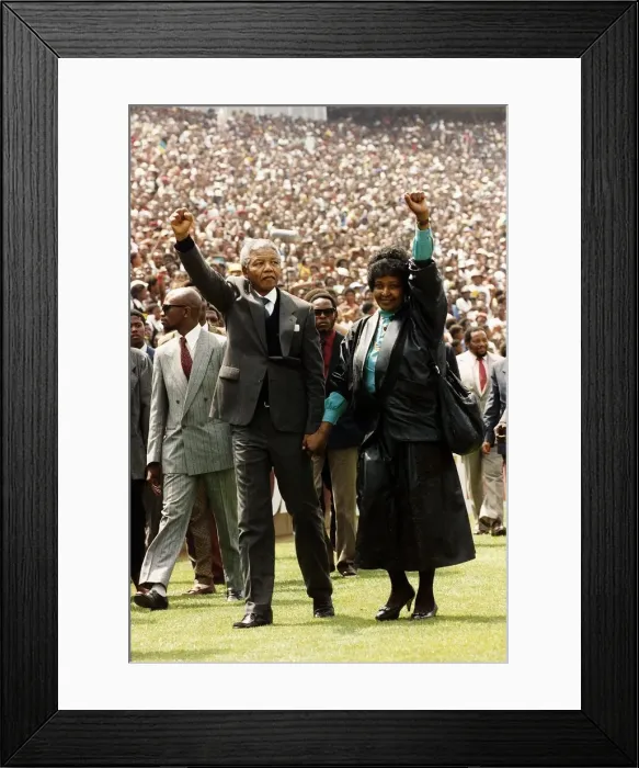Framed Print : Nelson Mandela leader of ANC released from prison 1990 salutes the crowd with his Framed Print : Nelson Mandela leader of ANC released from prison 1990 salutes the crowd with his