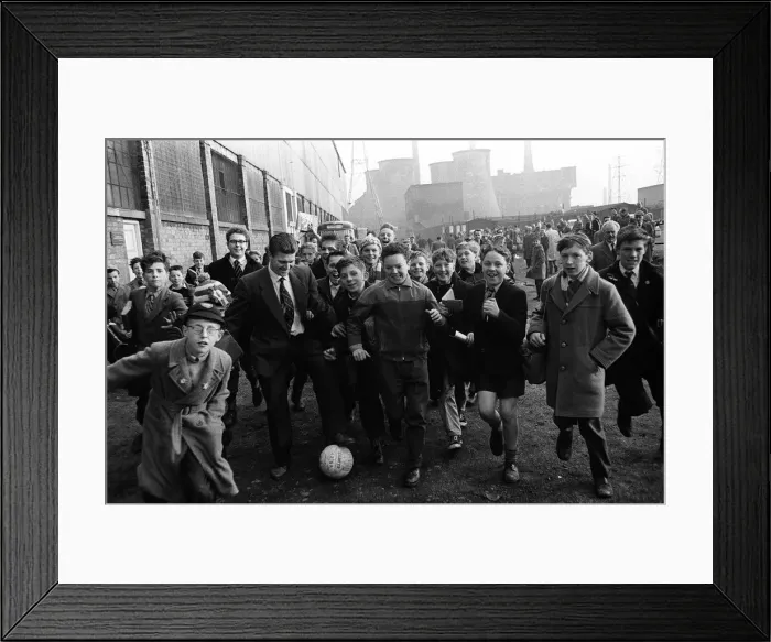 Framed Print : Leicester town folk play football before the 1961 FA Cup Final between Leicester City