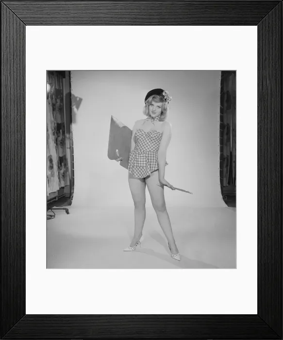 Framed Print : Reveille art Feature. Model Peggy Cage seen here wearing a check short summer dress Framed Print : Reveille art Feature. Model Peggy Cage seen here wearing a check short summer dress
