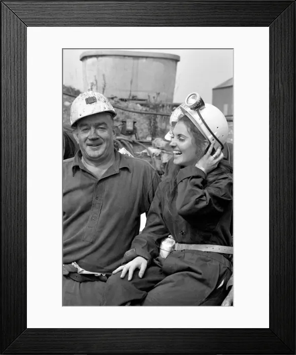 Framed Print : Believe it or not the grimy person in the oversize overalls