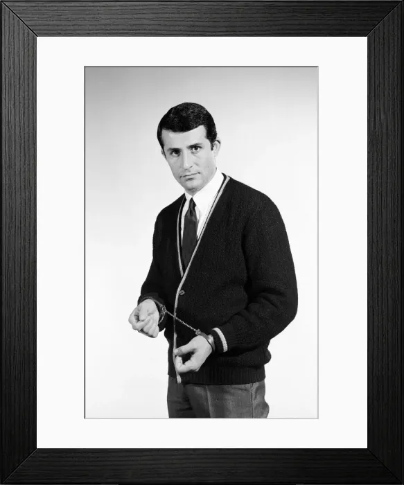 Framed Print : Handcuffs feature. Model Henry Fern in cardigan wearing handcuffs. Circa 1964