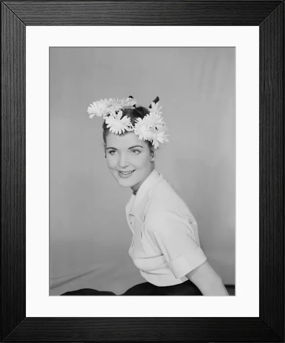 Framed Print : Reveille model seen here wearing a flower circle in her hair Framed Print : Reveille model seen here wearing a flower circle in her hair