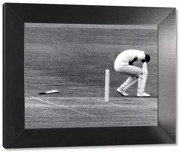 Tony Greig recieves a blow where it hurts from Australian fast bowler Dennis Lillee