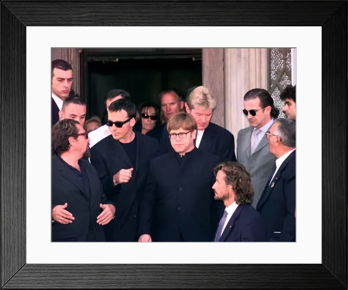 Framed Print : Elton John leaves Gianni Versace memorial service July 1997 with boyfriend David Framed Print : Elton John leaves Gianni Versace memorial service July 1997 with boyfriend David
