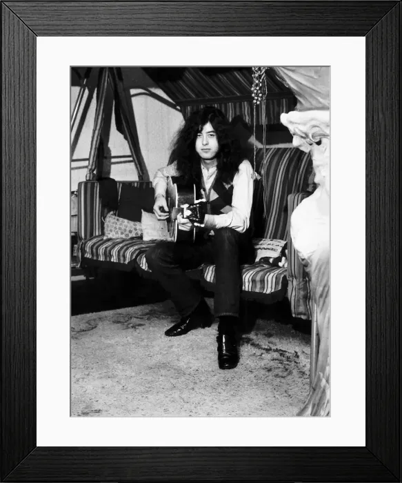 Framed Print : Jimmy Page of Led Zeppelin at home with his guitar Framed Print : Jimmy Page of Led Zeppelin at home with his guitar
