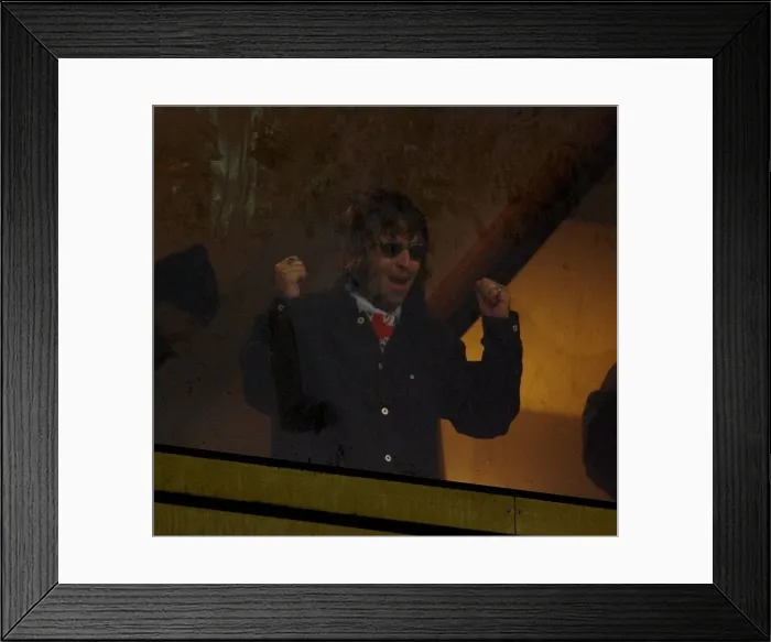 Framed Print : Liam Gallagher of Oasis celebrates the win May 1999 of his team Gillingham v Framed Print : Liam Gallagher of Oasis celebrates the win May 1999 of his team Gillingham v