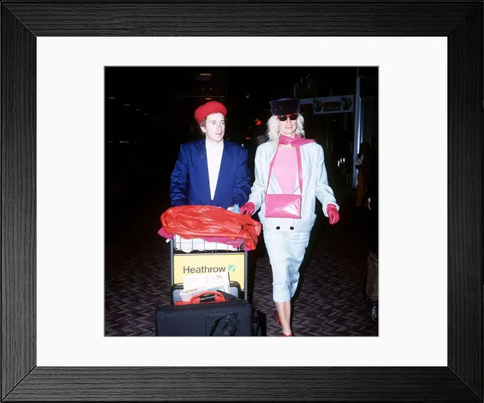 Framed Print : John Lydon of Public Image with wife Nora at lap 1988 Framed Print : John Lydon of Public Image with wife Nora at lap 1988