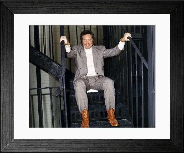 Framed Print : Tom Jones singer entertainer sits on stairs Framed Print : Tom Jones singer entertainer sits on stairs