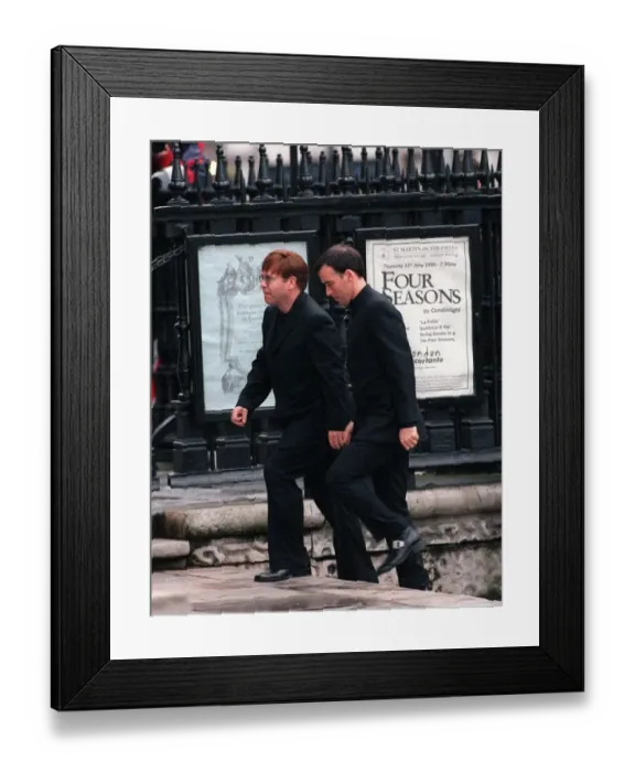Framed Print : Sir Elton John and David Furnish at memorial service 1998 for Linda McCartney