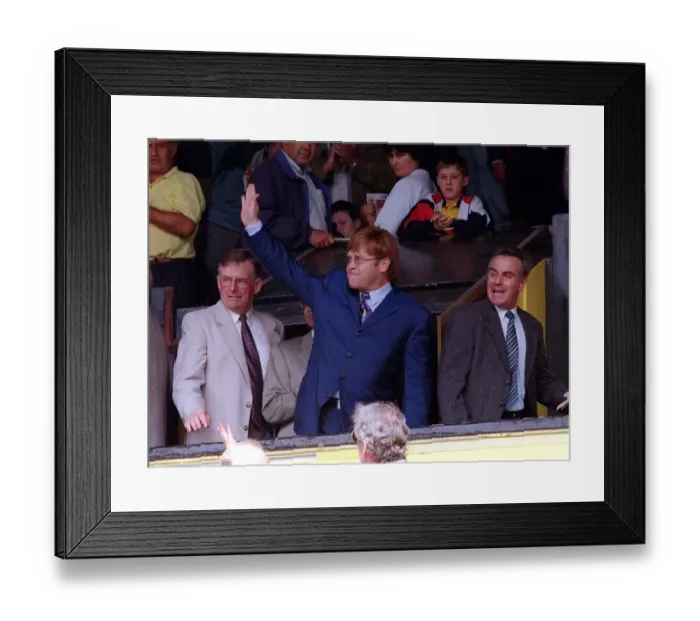 Framed Print : Singer and Watford Chairman Elton John acknowledge the standing ovation from the fans as