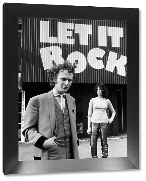 Malcolm McLaren dressed as a teddy boy outside his shop 'Let it Rock'