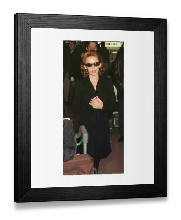 Framed Print : Kylie Minogue leaving Heathrow for Glasgow Framed Print : Kylie Minogue leaving Heathrow for Glasgow