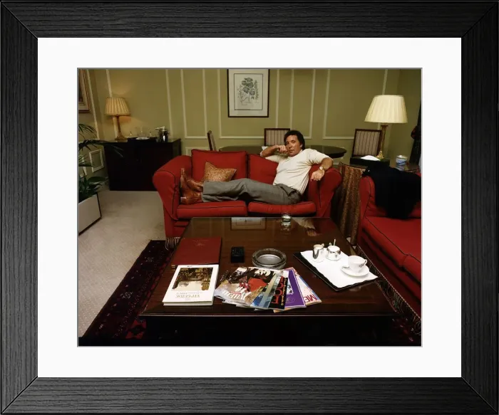 Framed Print : Tom Jones singer sits on sofa setee in lounge Framed Print : Tom Jones singer sits on sofa setee in lounge