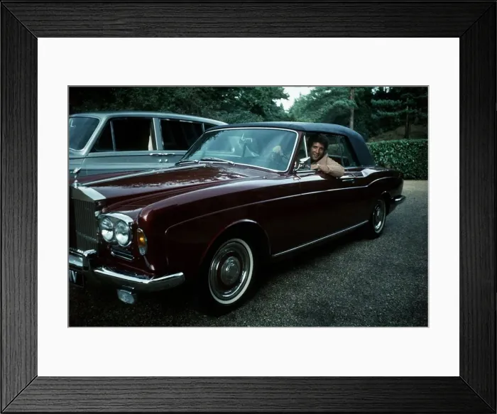 Framed Print : Tom Jones Singer in the driving seat of a Rolls Royce