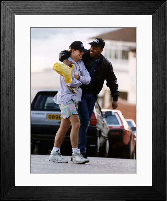 Framed Print : Jason Donovan Actor / Singer with minder Barrie Knight Framed Print : Jason Donovan Actor / Singer with minder Barrie Knight