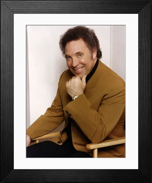 Framed Print : Tom Jones singer sits in chair Framed Print : Tom Jones singer sits in chair