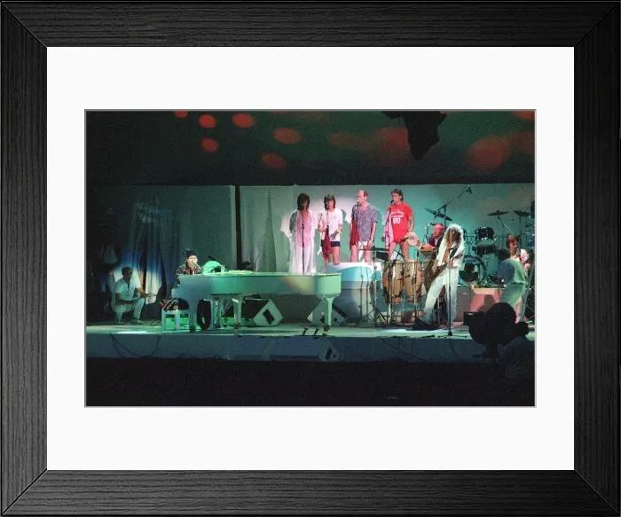 Framed Print : Elton John performing at Live Aid concert at Wembley July 1985 Framed Print : Elton John performing at Live Aid concert at Wembley July 1985