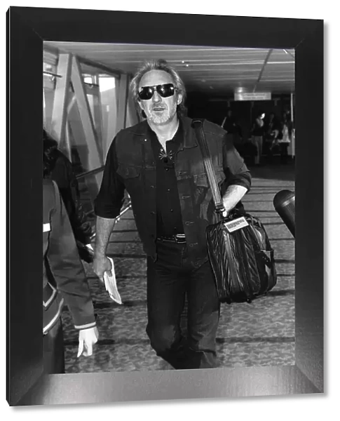 John Entwhistle of The Who leaving Heathrow for Los Angeles