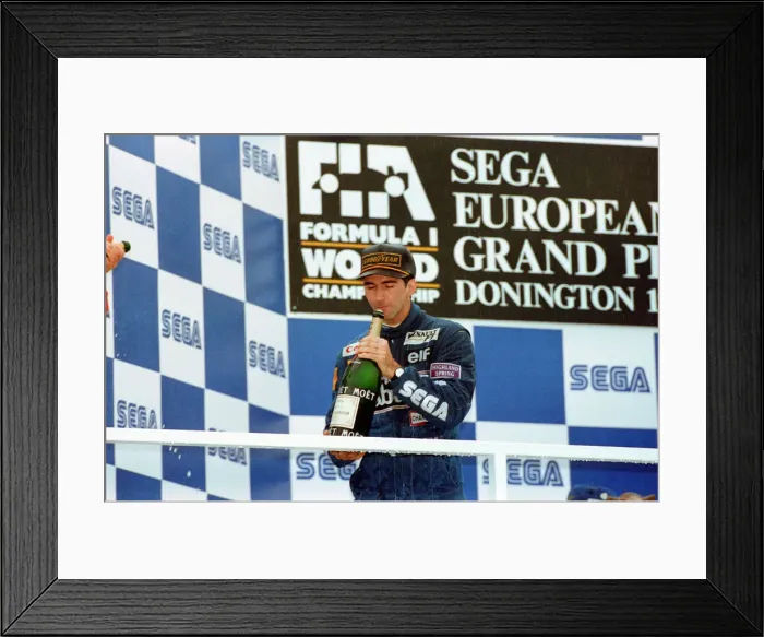 Framed Print : European Grand Prix at Donington 11th April 1993. Damon Hill on the podium Framed Print : European Grand Prix at Donington 11th April 1993. Damon Hill on the podium