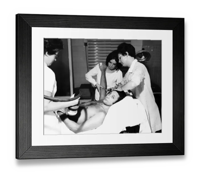 Framed Print : Tom Jones singer at enjoying a massage at a health farm before his show