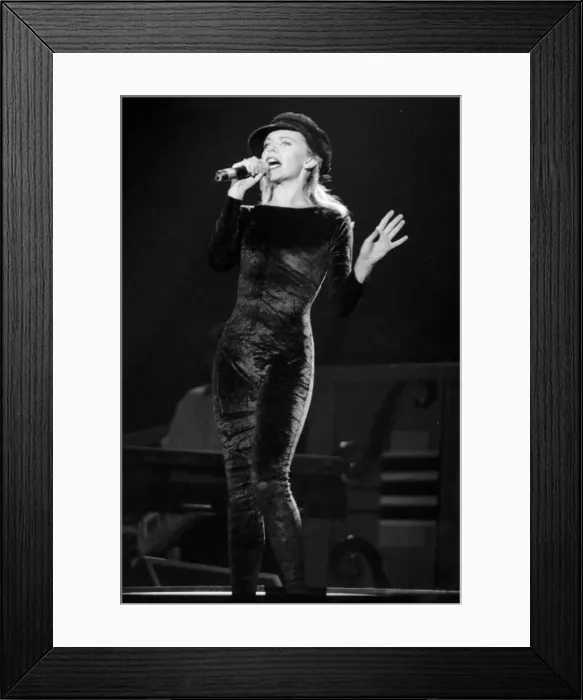 : Kylie Minogue singing during her concert : Kylie Minogue singing during her concert