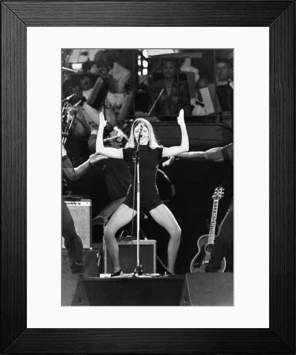 : Kylie Minogue dancing during her song at the John Lennon Memorial concert : Kylie Minogue dancing during her song at the John Lennon Memorial concert
