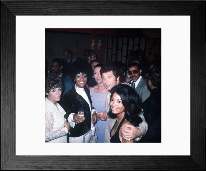 Framed Print : Tom Jones Singer chats with some members of the American pop group the 5th Dimension at a