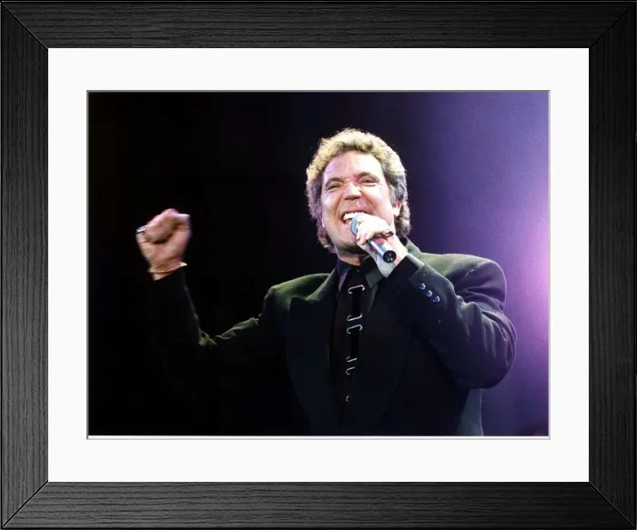 Framed Print : Tom Jones British Singer Singing at Simple Truth concert Holding microphone