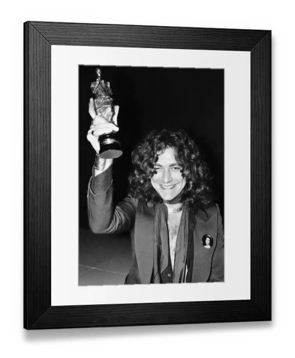 Framed Print : Lead singer of group Led Zeppelin Robert Plant with an Ivor Novello Award Framed Print : Lead singer of group Led Zeppelin Robert Plant with an Ivor Novello Award