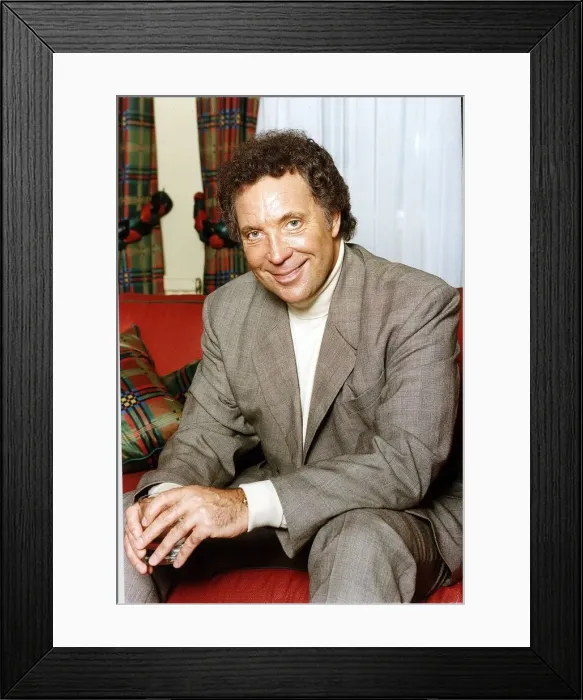 Framed Print : Tom Jones British singer Sitting on a red couch Framed Print : Tom Jones British singer Sitting on a red couch