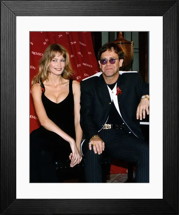 Framed Print : Elton John singer with Claudia Schiffer model Framed Print : Elton John singer with Claudia Schiffer model