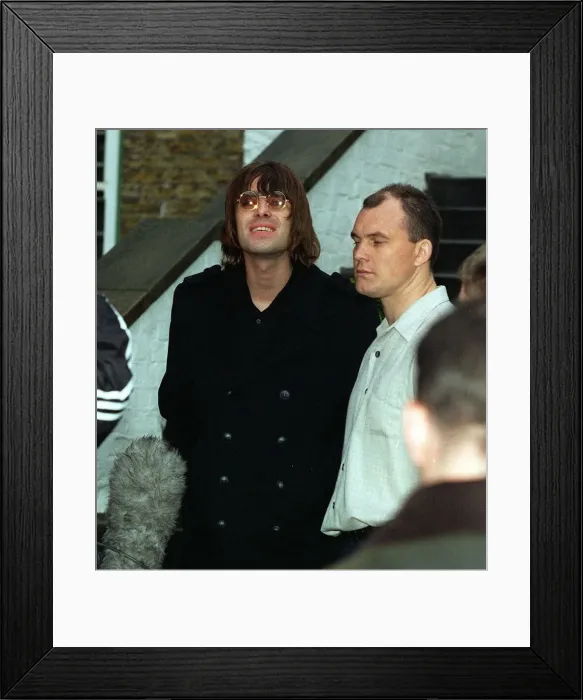 Framed Print : Liam Gallagher lead singer with the pop group Oasis leaves his St Johns Wood home for Framed Print : Liam Gallagher lead singer with the pop group Oasis leaves his St Johns Wood home for