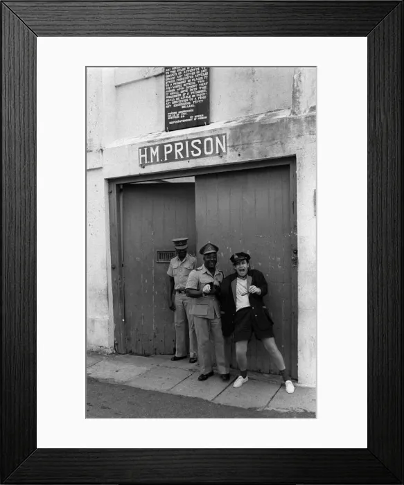 : Sir Elton John pictured outside the jail in the West Indies on the Island of Monstserrat : Sir Elton John pictured outside the jail in the West Indies on the Island of Monstserrat
