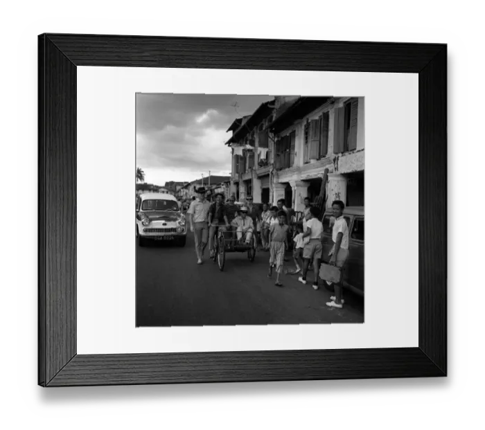 Framed Print : Freddie & the Dreamers pop group in Singapore March 1965 Riding along the street in