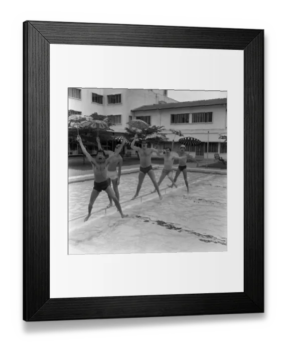 Framed Print : Freddie & the Dreamers Pop Group in Singapore March 1965 Jumping into swimming pool