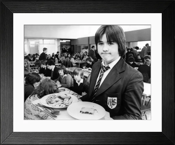 Framed Print : Ian Mullaney enjoys his school dinner in a crowded dining hall