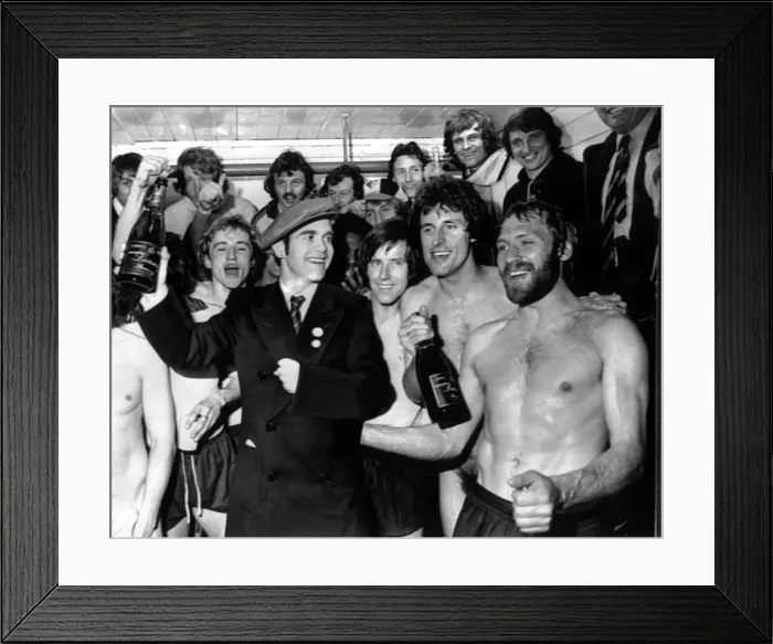 Framed Print : Graham Taylor (Top right) and the Watford team celebrate in the dressing room after