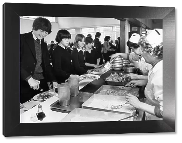Pupils at Hirst High School in Ashington queue for their school dinner