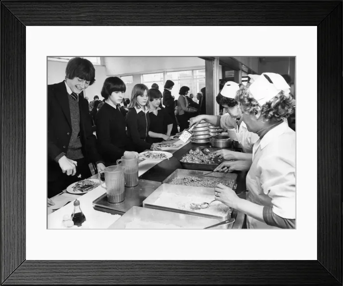 Framed Print : Pupils at Hirst High School in Ashington queue for their school dinner