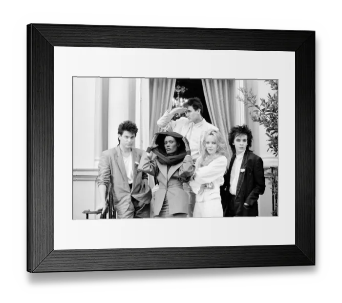 Framed Print : Duran Duran with Grace Jones and Tanya Roberts at a press call the day after the film