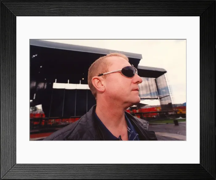 Framed Print : Singer songwriter John Miles, surveys the scene the day before playing the Gateshead