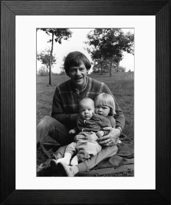 Framed Print : Alex Higgins former World Snooker Champion 1983 with his two children at home Framed Print : Alex Higgins former World Snooker Champion 1983 with his two children at home